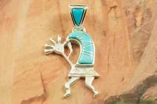  Beautiful Night Sky Kokopelli Design by Calvin Begay Genuine Picture Jasper, and Acoma Jet inlaid in Sterling Silver Pendant with Beautiful Fire and Ice Lab Opal Shooting Star. &nbsp;18" Sterling Silver Rope Chain is included. Designed by Navajo Artist Calvin Begay. Signed by the artist.  